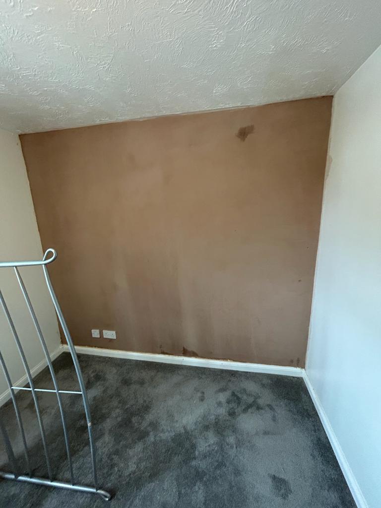 A wall freshley plastered in Weston-Super-Mare after damp issue had been repaired
