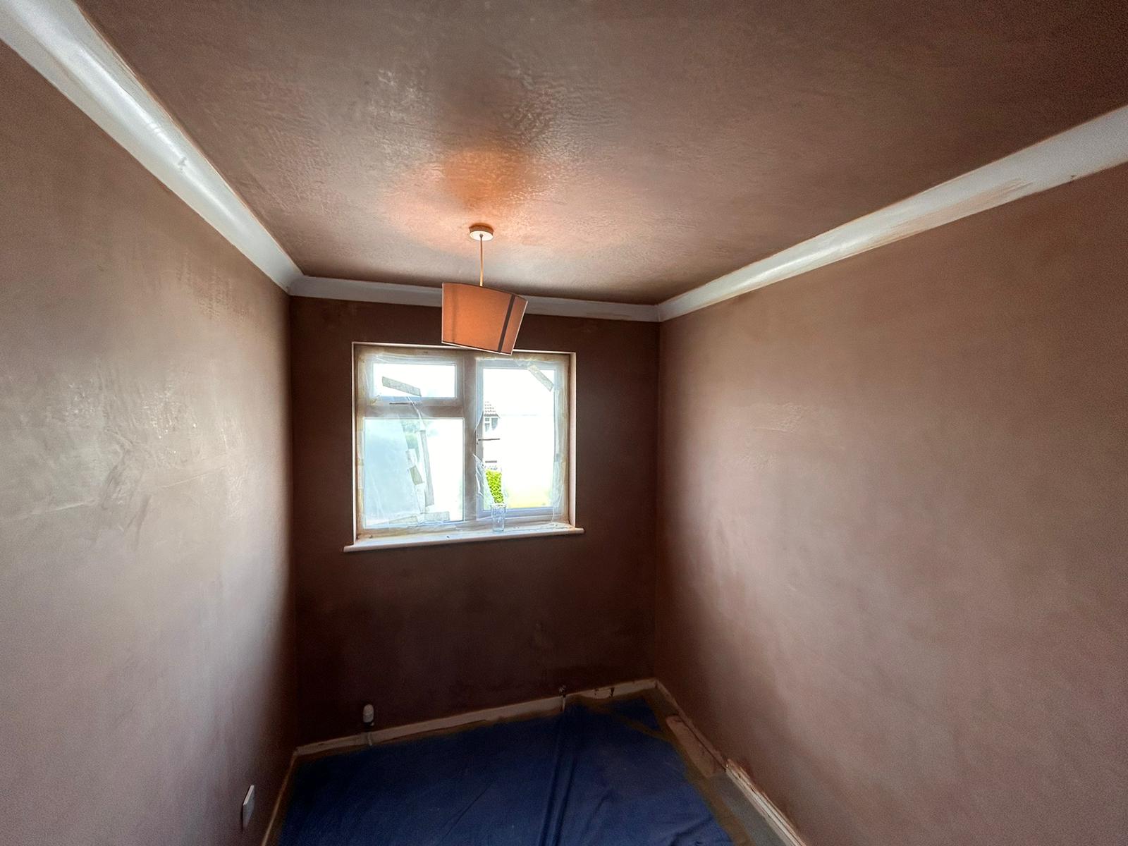 Walls plastered in a room in Longwell Green